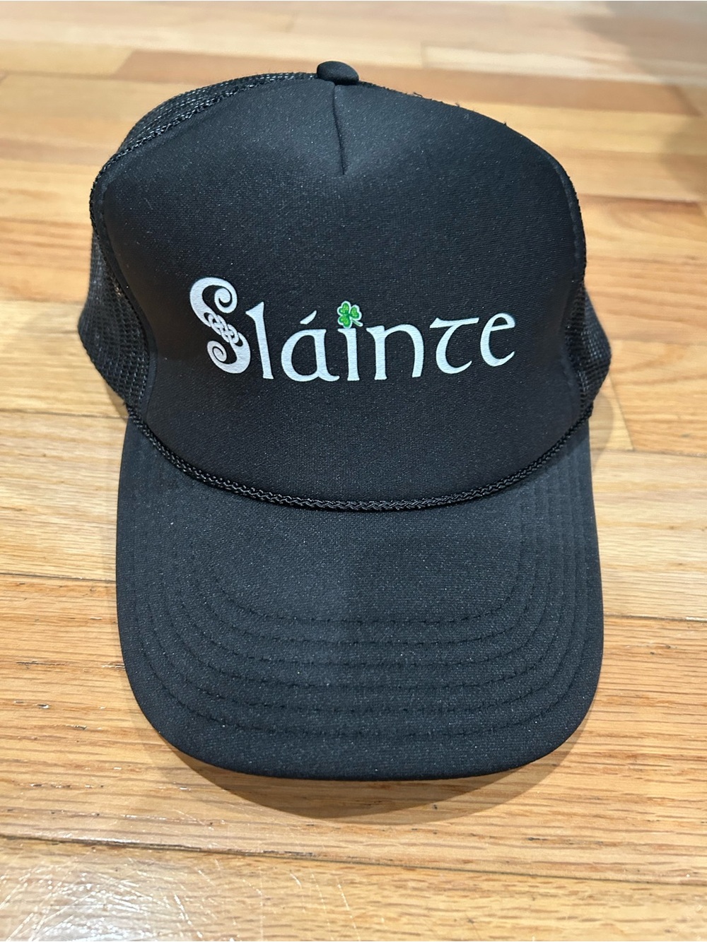 Sláinte Black Trucker Hat with Green Shamrock
